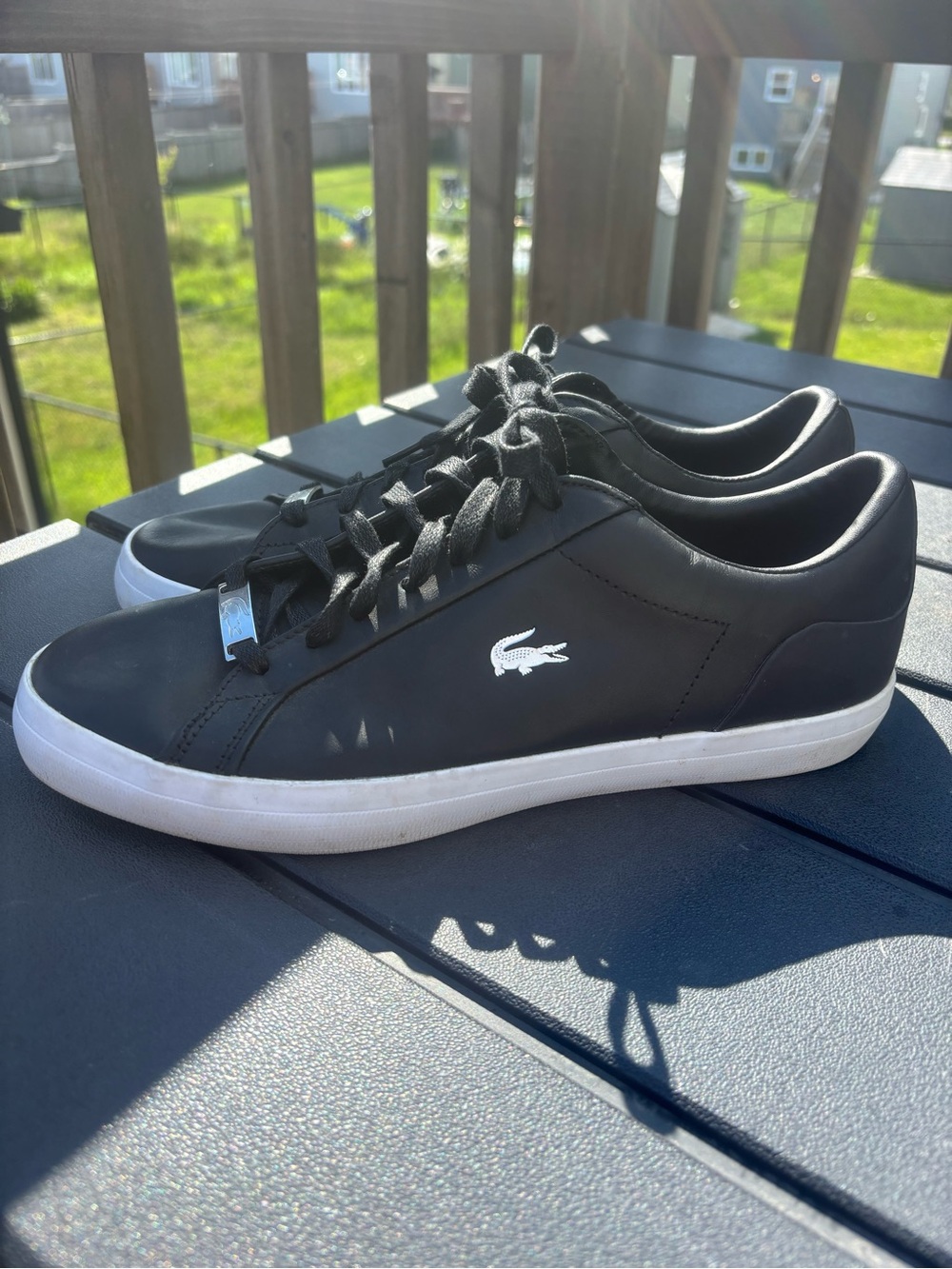 Lacoste women’s Black Low-Top Sneakers with White Sole